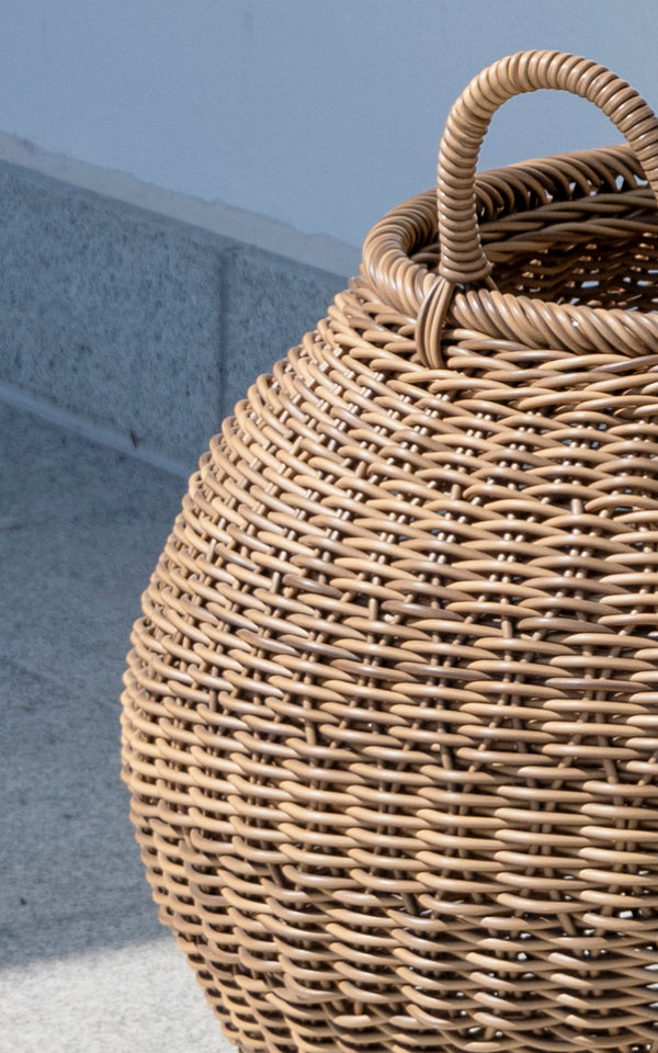 This is a close-up image of Smilla Basket in chestnut core weave ArtFibre Aluminium.