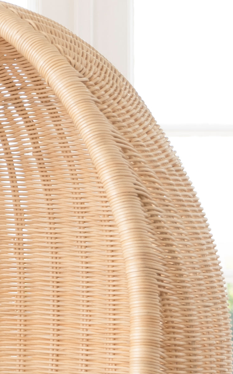 This is a close-up image of Hanging Egg Chair Junior in natural core weave Rattan frame.