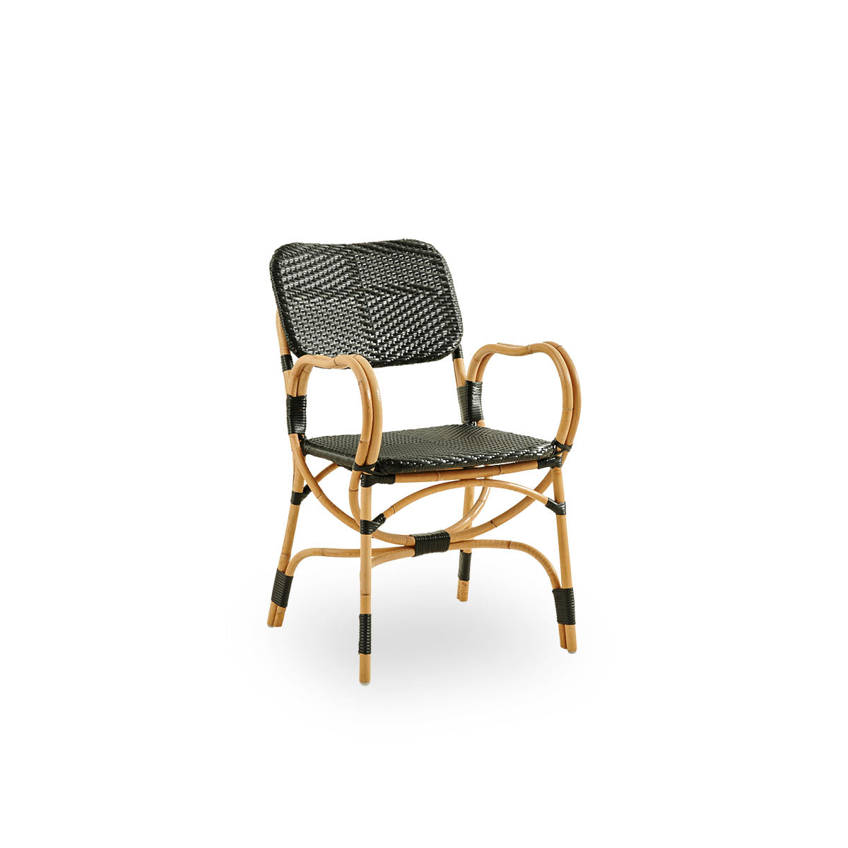 Side view of Bistro chair in black ArtFibre weave with elegant design. Rattan frame with seat woven in ArtFibre. The curved Rattan frame under the seat extend into armrests.