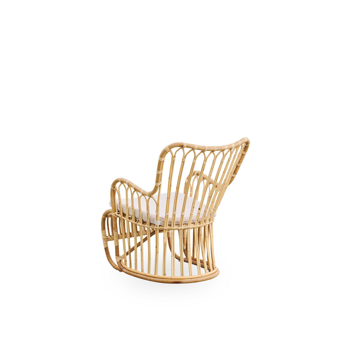 Plain back view of Tulip lounge chair designed by Tove Kindt-Larsen, with soft organic lines. Handcrafted from high-quality Indonesian rattan.