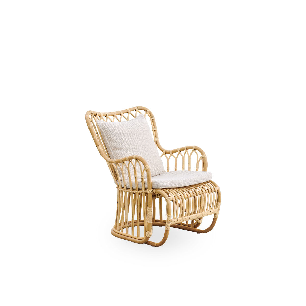 Side view of Tulip lounge chair designed by Tove Kindt-Larsen, with soft organic lines. Handcrafted from high-quality Indonesian rattan