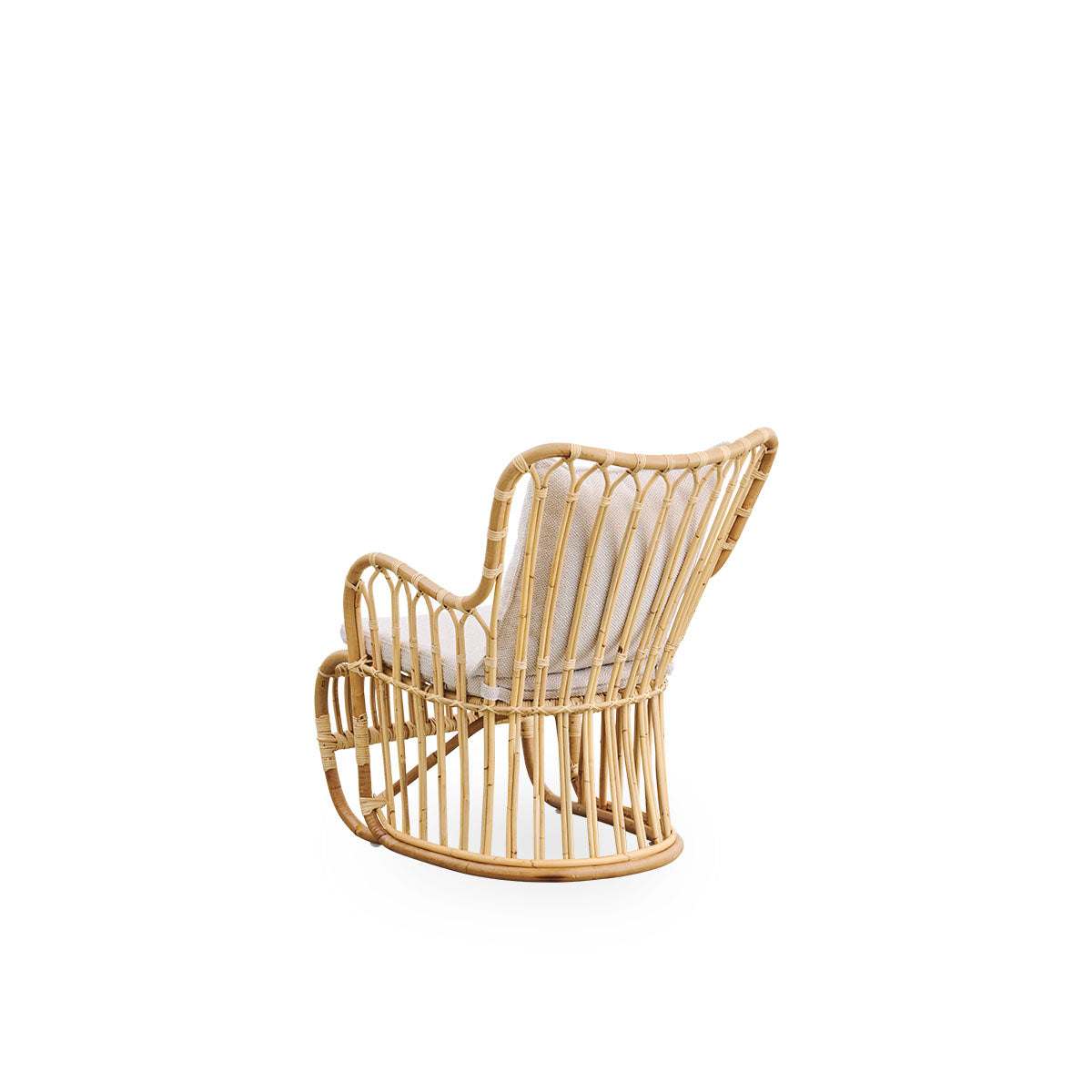 Plain back view of Tulip lounge chair designed by Tove Kindt-Larsen, with soft organic lines. Handcrafted from high-quality Indonesian rattan.