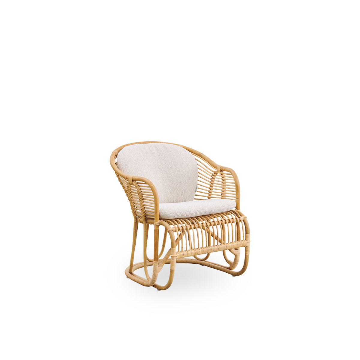 Side view of Swing lounge chair designed by Tove Kindt-Larsen. Handcrafted from high-quality Indonesian rattan and fitted with seat and back cushion.