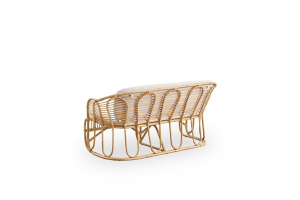 Back side view of the Swing 2-seater sofa designed by Tove Kindt-Larsen.
Handcrafted from high-quality Indonesian rattan and fitted with seat and back cushion.