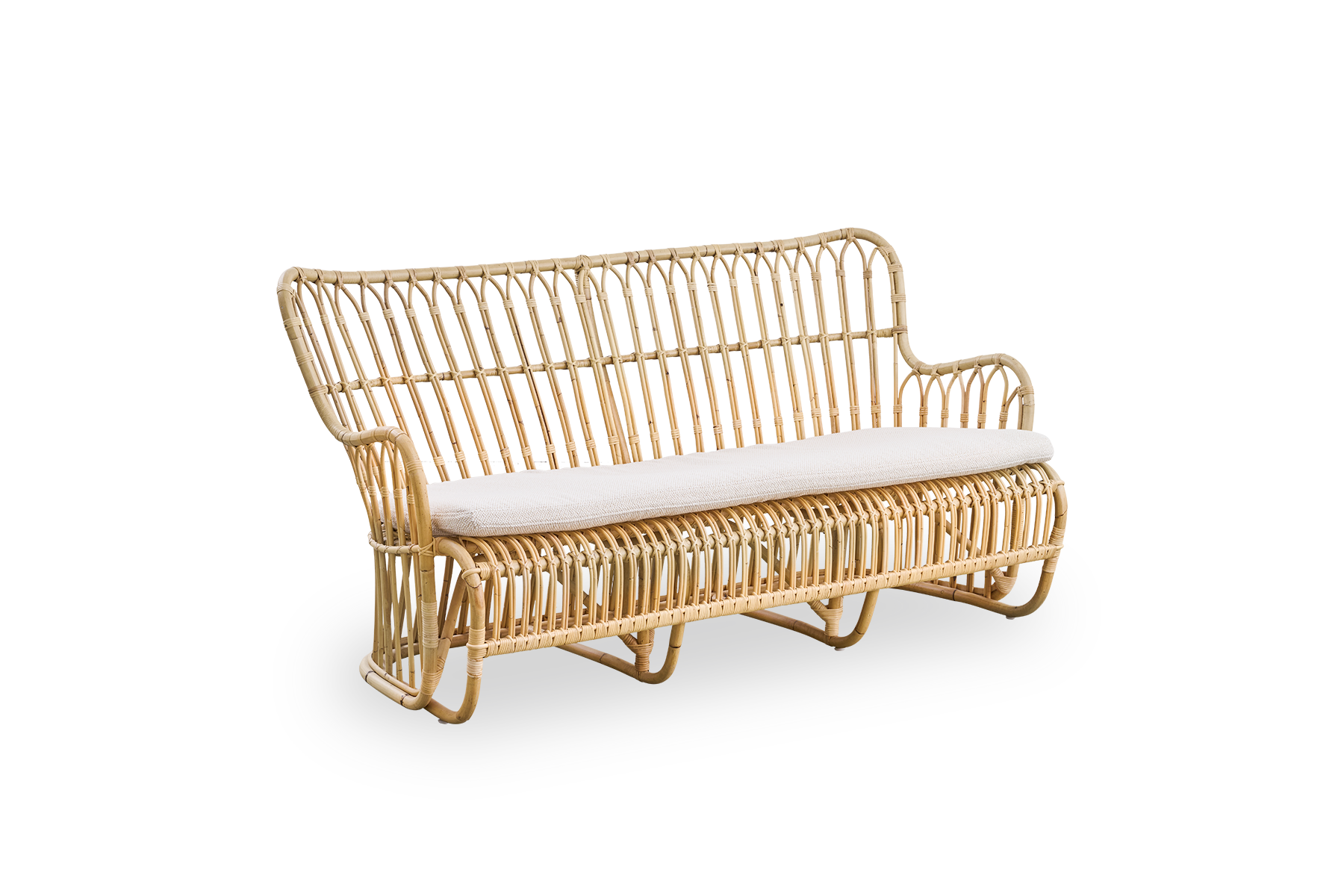 Side view of Tulip wicker sofa designed by Tove Kindt-Larsen, with soft organic lines. Handcrafted from high-quality Indonesian rattan