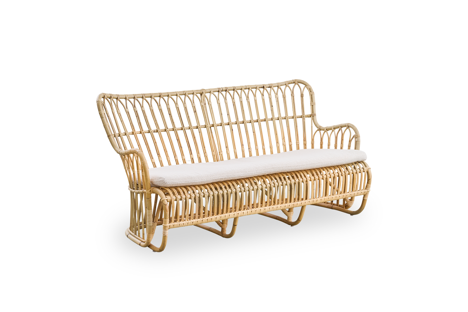 Side view of Tulip wicker sofa designed by Tove Kindt-Larsen, with soft organic lines. Handcrafted from high-quality Indonesian rattan