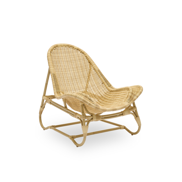 Side view of Pacifique Exterior lounge chair designed by Michel Buffet. Aluminium frame in rattan look with fully woven seat handcrafted in ArtFibre. 