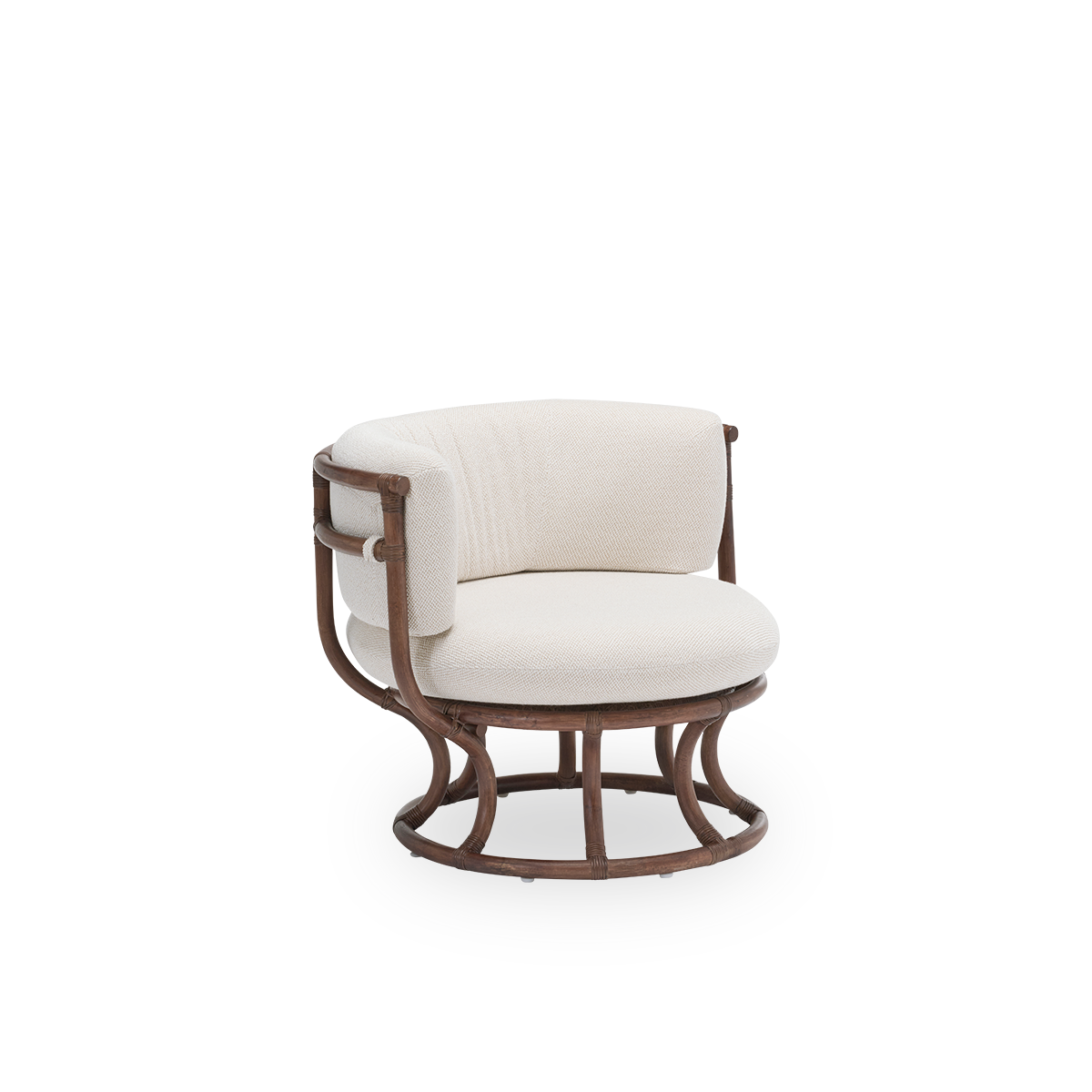 Side view of the Coco lounge chair with seat and back cushions, in brown rattan. Designed by Nanna Ditzel in 1973 and based on perfect circles and half circles. Handcrafted from premium Indonesian rattan.