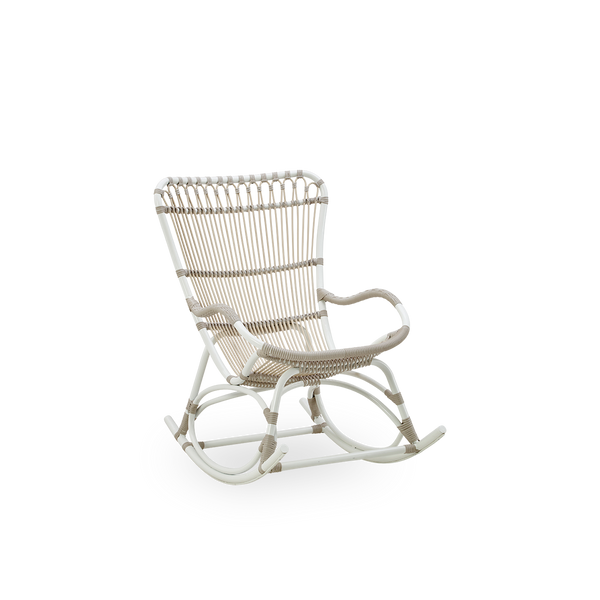 Side view of Monet outdoor rocking chair with high backrest and armrests presented in Dove White color. Aluminium frame with ArtFibre windings.
