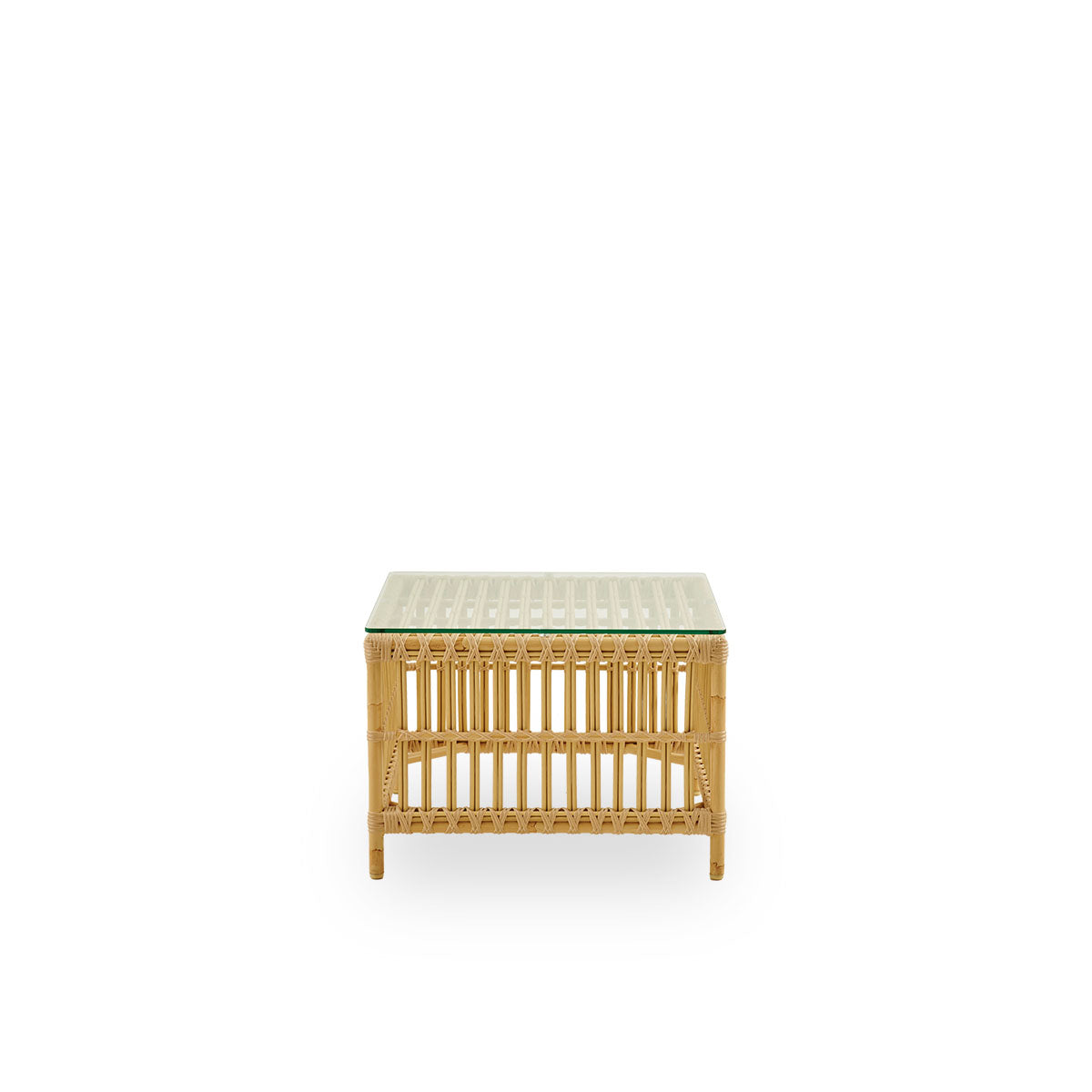 Plain side view of The Caroline Exterior side table in the color Natural that looks like rattan. A small, elegant outdoor side table that offers unique strength and durability. The frame is made from aluminum with elegant ArtFibre details.
