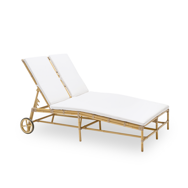 Side view of the Julietta exterior double sunbed with seat cushion, in natural aluminium and ArtFibre. Designed by Sika-Design and built in weather-resistant materials for two to share.
