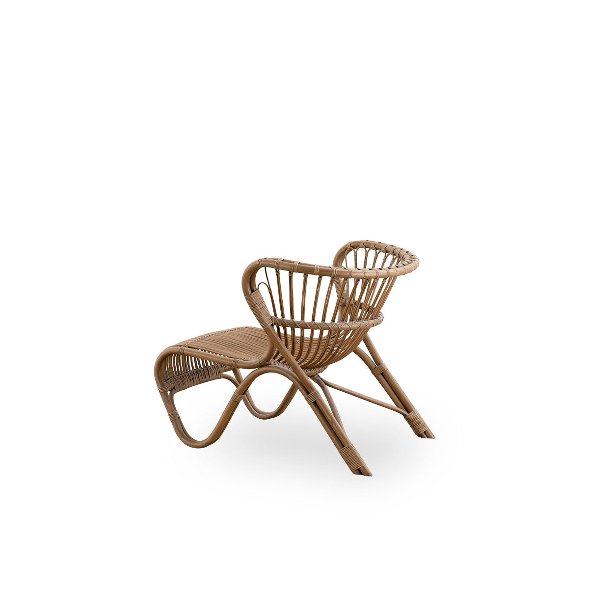 Plain back view of Fox lounge chair in antique brown rattan color designed by Viggo Boesen. Low curvy wicker lounge chair handcrafted from high-quality Indonesian rattan.