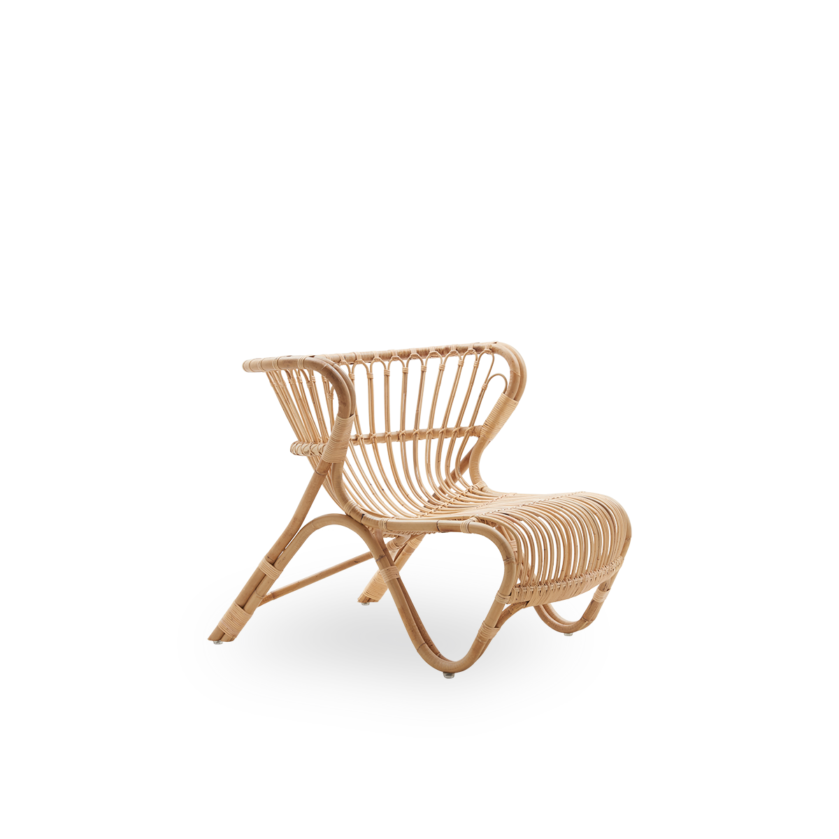 Side view of Fox lounge chair in natural rattan color designed by Viggo Boesen. Low curvy wicker lounge chair handcrafted from high-quality Indonesian rattan.