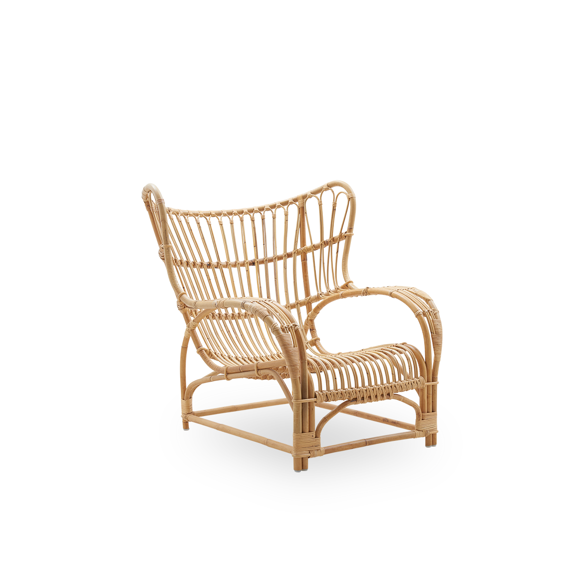 Side view of Teddy lounge chair by Viggo Boesen, big embracing lounge chair inspired by the 19th-century wing chair. Handcrafted from high quality Indonesian rattan