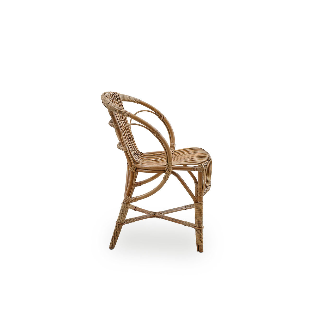 Plain side view of Robert dining chair in antique brown color designed by Robert W. Elegant wicker chair handcrafted from high-quality Indonesian rattan.