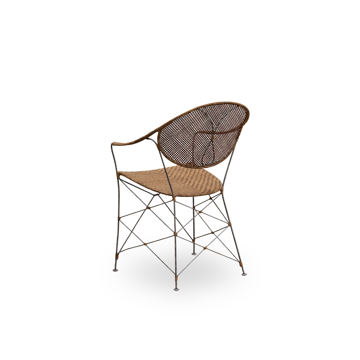 Back side view of the Funky dining chair designed by Yuzuru Yamakawa.
The chair has a steel frame with a handwoven seat and backrest made from high-quality Indonesian rattan in hazelnut color.