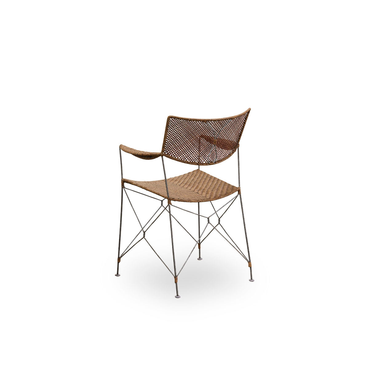 Back side view of the Rap dining chair designed by Yuzuru Yamakawa.
Steel frame with seat and backrest handwoven with Indonesian rattan. Lightweight chair combining Japanese design with traditional Indonesian craftsmanship.